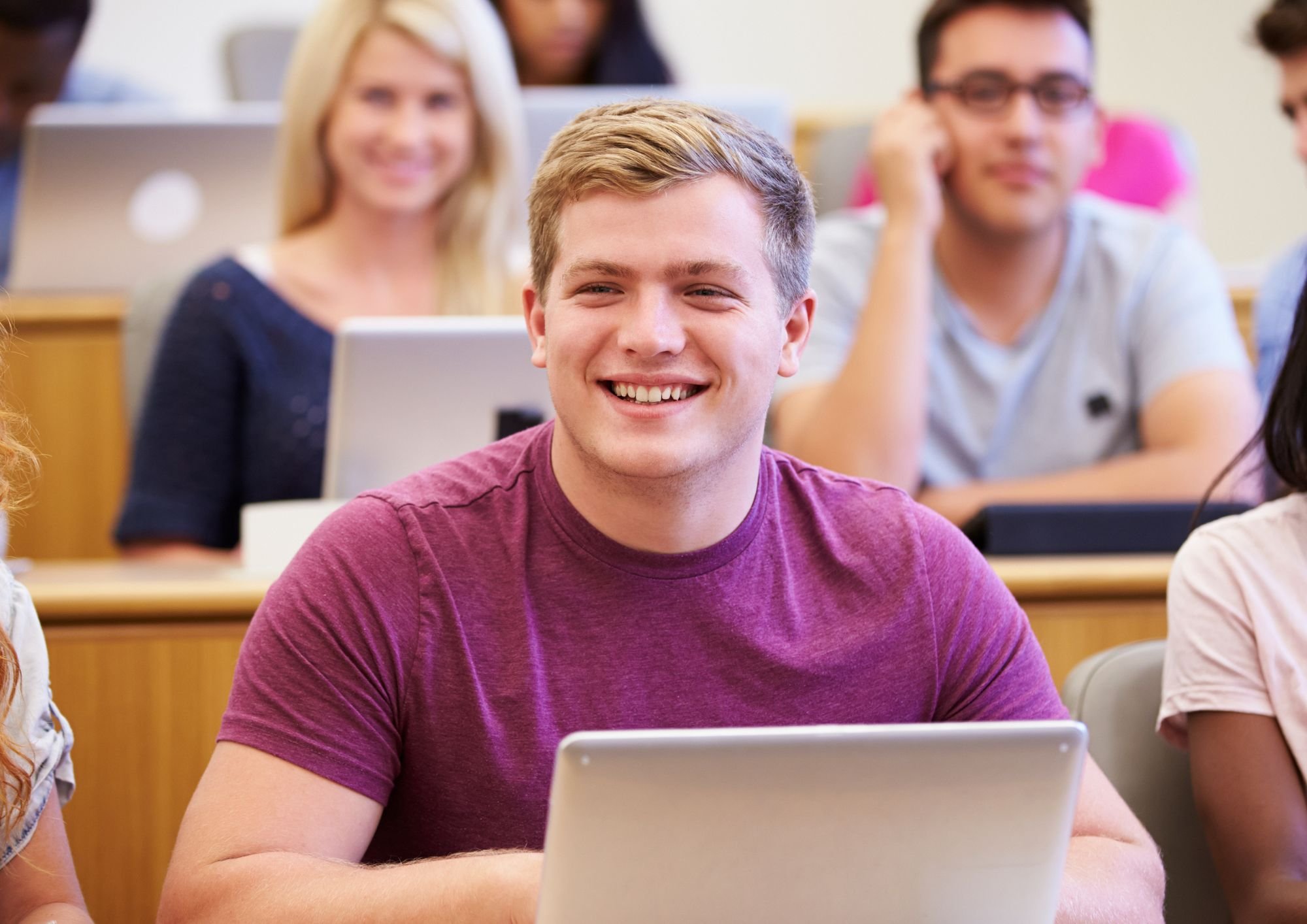 Student laughing in lecture hall